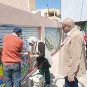 تجميل اسوار المدراس بمبادرة المنيا اجمل مدينة
