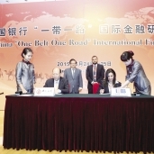 جانب من توقيع اتفاقية بين البنك التجارى الدولى وبنك الصين