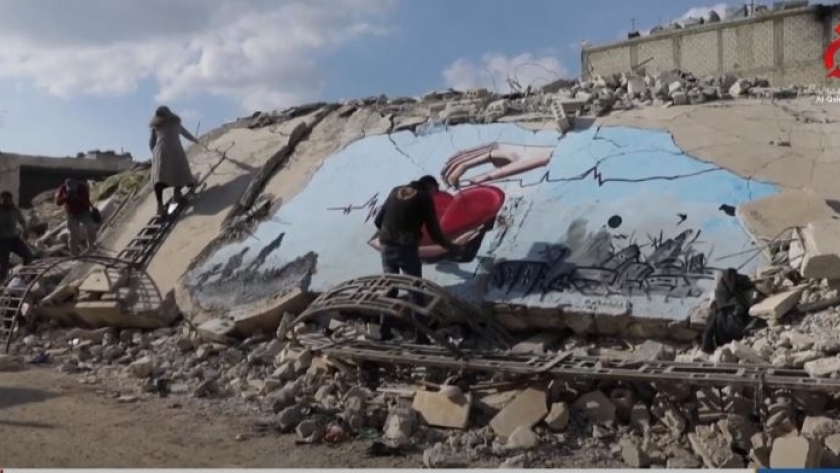 لوحة فنية على حطام زلزال سوريا