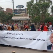 وقفة احتجاجية قرية محامي محتجز بالسعودية