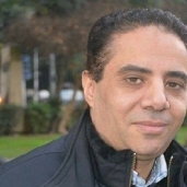 الكاتب الصحفي أيمن الحكيم