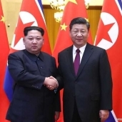 الرئيس الصيني شي جين بينج وزعيم كوريا الشمالية كيم جونج أون