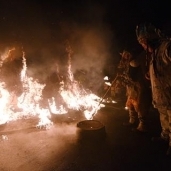 بالصور| "ليلة العام الجديد".. بريطانيون يشعلون النيران لقتل الأرواح الشريرة