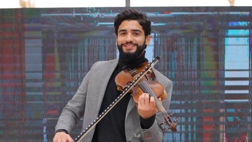عازف الكمان محمد عادل