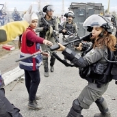 فلسطينيون يتحدون جيش الاحتلال فى «جمعة الإرادة» بالقدس أمس «أ. ف. ب»