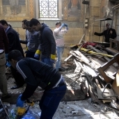 رجال المعمل الجنائى أثناء معاينة تفجير الكنيسة البطرسية بالقاهرة «صورة أرشيفية»