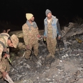 السلطات الباكستانية تحقق في أسباب تحطم الطائرة