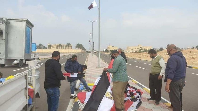تعليق العلم المصري على طريق استاد برج العرب