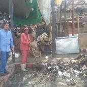 بالصور| استجابة لـ"الوطن".. شرطة المرافق ترفع القمامة من سوق الخضار في الغردقة