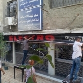 بالصور| القاهرة تتصدى لـ"مافيا الكافيهات" وتزيل الإشغالات بـ "شيراتون"