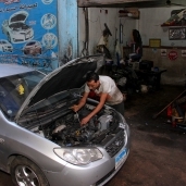 إحدى ورش إصلاح السيارات بمنطقة صقر قريش