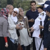 الشرطة النسائية تنتشر بين المواطنين فى العيد