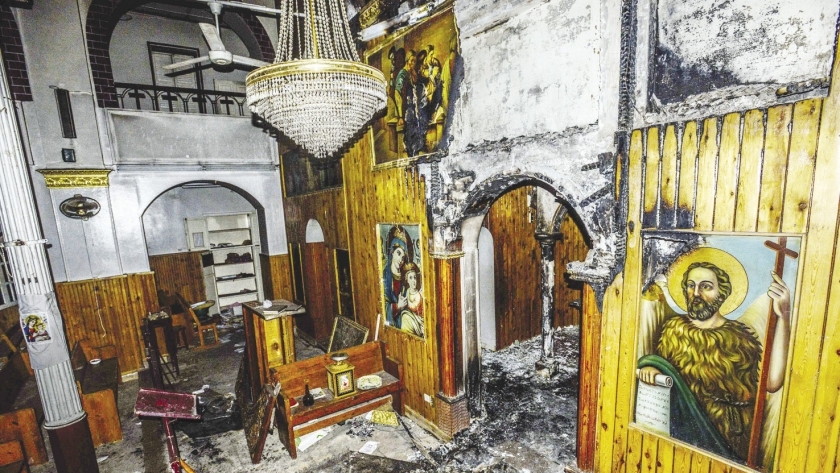 «كنائس ملوى» بعد الاعتداء عليها من «الإرهابية» بعد فض «رابعة» «صورة أرشيفية»