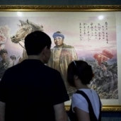 بالصور| افتتاح أول معرض للرسامين الكوريين الشمالين في بكين