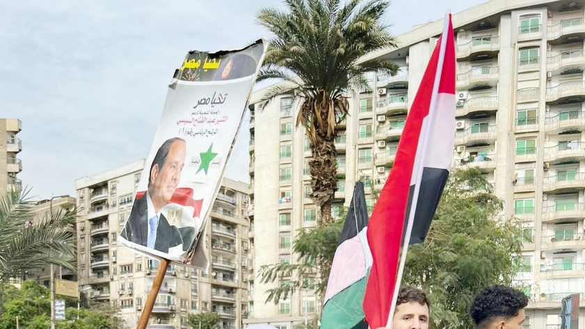 «زينب» حملت علمى مصر وفلسطين خلال توجهها للانتخابات