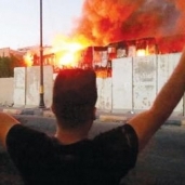 متظاهرون يضرمون النار بالقنصلية الإيرانية في البصرة
