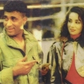 سحر رامي وأحمد زكي في مشهد من «كابوريا»