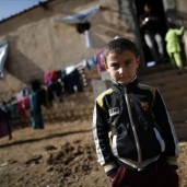 بالصور| أطفال العراق الناجون من جحيم الإرهاب يستعيدون بعضا من طفولتهم