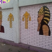 محافظ سوهاج يكلف بإزالة رسومات الفرعونية الخاطئة من سور مدرسة طه حسين