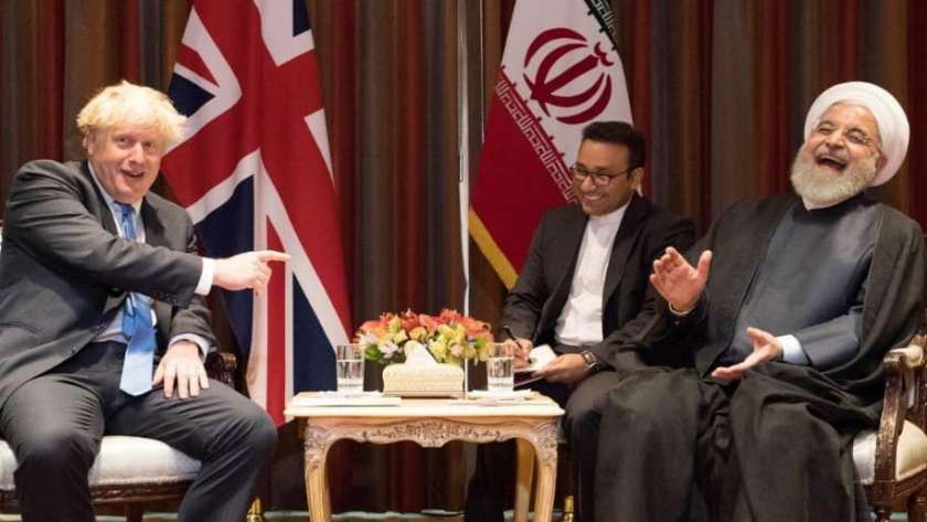 لقاء سابق بين رئيس الوزراء البريطاني والرئيس الإيراني