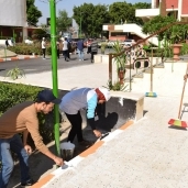 جوالة جامعة سوهاج يشاركون بنظافة مقرهم