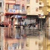 بالصور| غرق شوارع الإسكندرية بمياه الأمطار وخلوها من المارة