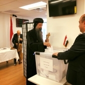 بالصور| أساقفة الكنيسة يشاركون في الانتخابات بالخارج