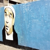 جدارية لـ«محمد شرف» على حائط بالإسكندرية