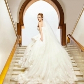 بالصور| مي فخري بـ"فستان زفاف" في جلسة تصوير جديدة