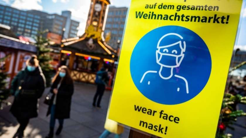 لافته في المانيا تطالب المواطنين بارتدائء الكمامات بسبب كورونا