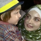 الطفل الشيشاني بلال تاغيروف يعود إلى حضن أمه بعد نجاته من حرب الموصل