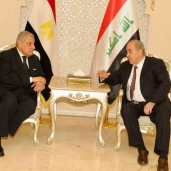 جانب من لقاء محلب مع مسؤول عراقي