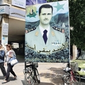 صور بشار الأسد فى شوارع دمشق «أ. ف. ب»