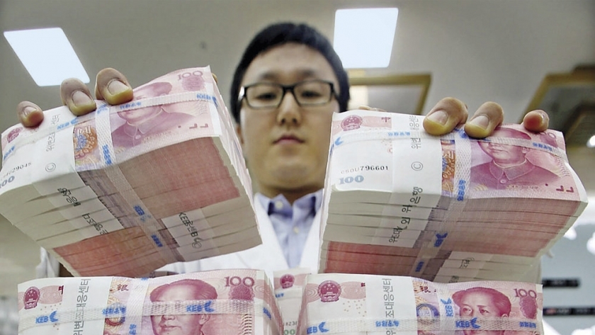 الصين تخفض سعر اليوان لأدنى مستوى