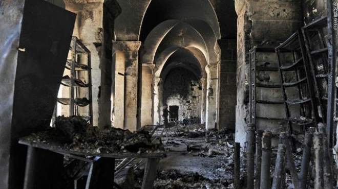  الحكومة والمعارضة السورية يتبادلان الاتهامات حول هدم مئذنة الجامع الأموي 