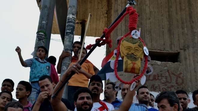  فرحة عارمة ومشانق رمزية لمرسي وأعضاء 