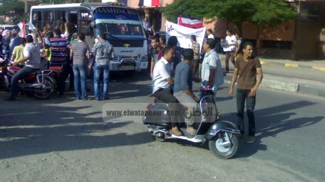 مسيرة بالطبول والدراجات النارية في المنيا تطالب برحيل مرسي