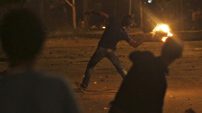 اشتباكات بالخرطوش والرصاص الحي بين أنصار ومعارضي مرسي في 