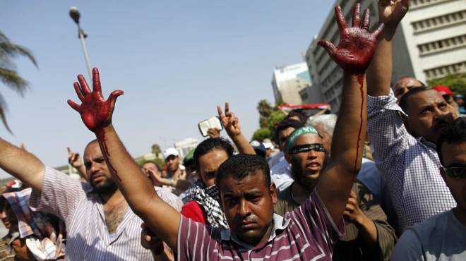 رويترز: حزب الحرية والعدالة يقول إن 16 قتلوا خلال فض اعتصام لمؤيدي 