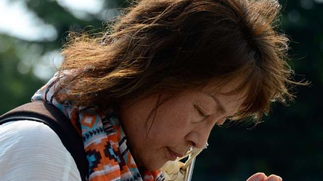 بالصور| آلاف اليابانيين يحييون ذكرى كارثة "هيروشيما" النووية