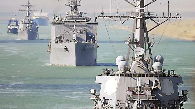 سفن حربية أمريكية ترافق حاويات تجارية بريطانية عبر 