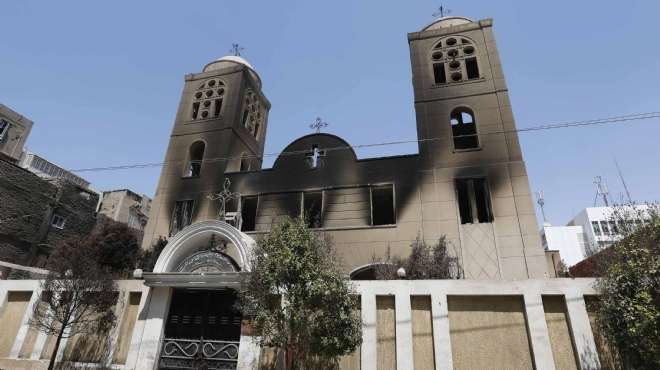  القبض على أحد المتهمين بإحراق كنيسة مارمينا في أسيوط 