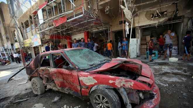  بالصور| انفجار سيارة ملغومة في أحد أحياء العاصمة العراقية 