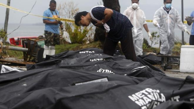 تأجيل دفن جماعي لضحايا الإعصار في الفلبين بعد إطلاق نار