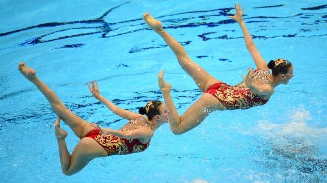 بالصور| بمشاركة مصرية أفضل اللقطات من السباحة التوقيعية فى اليوم الرابع عشر من أوليمبياد لندن 2012