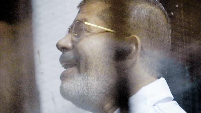 «مرسى» لزملائه فى السجن: «السيسى» سيدفع الثمن