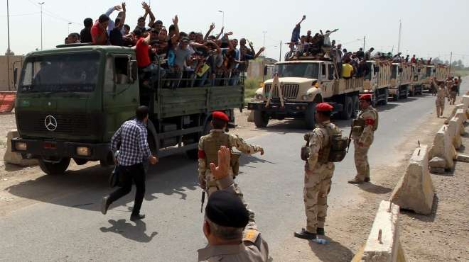 العراق: الاشتباكات على مشارف «بغداد» والحرس الثورى الإيرانى يظهر فى المعارك