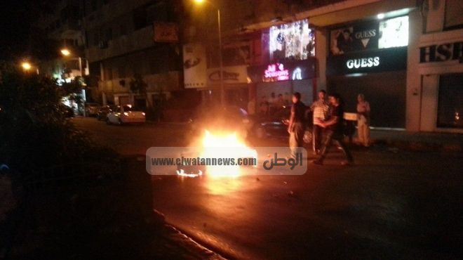  مجهولون يلقون زجاجات حارقة على إدارة مرور بورسعيد واحتراق سيارة ودراجتين 