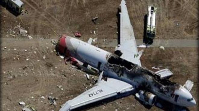 انتشال 21 جثة جديدة طواقم قرب مكان سقوط الطائرة الماليزية بأوكرانيا