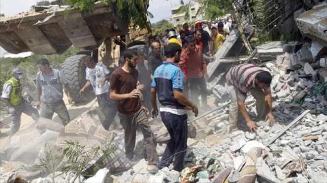 50 صورة توثق مجزرة إسرائيل في حي 